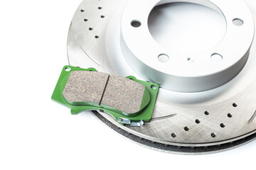 Wall Mural - Perforated brake discs, ceramic pads - everything for better braking. on a white background