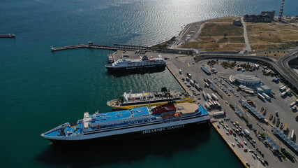 Aerial drone panoramic photo of famous and busy port of Piraeus where passenger ships travel to popular Aegean destinations, Attica, Greece