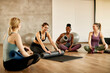 © Drazen - Group of diverse athletic women talking after exercise class in health club.