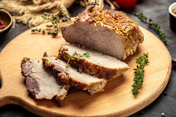 Wall Mural - roasted pork with mustard on a cutting board. banner, menu recipe