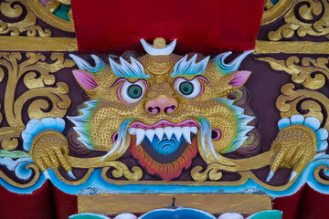 Wall Mural - Religious images in the shape of a tiger in the buddhist tibetan monastery near mountain village Leh in ladakh region, north India