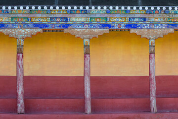 Wall Mural - Detail of painted wall in Thiksey Buddhist Monastery near mountain village Leh in ladakh, India