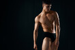 © SHOTPRIME STUDIO - sexy male bodybuilder in dark panties posing studio