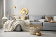 © New Africa - Cozy living room interior with knitted blanket on comfortable sofa