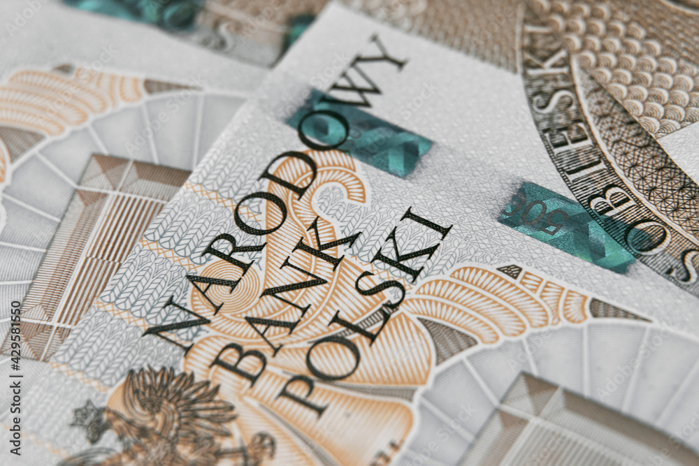 Close up on national polish bank of new Polish banknotes five hundred zloty. Macro photo of narodowy bank polski sign on PLN bill. Shallow focus. Close-up with fine and sharp texture - obrazy, fototapety, plakaty 