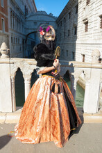 VENICE, ITALY - FEBRAURY 2020:Woman In Carnival Constume And Mask On Carnival In Venice In 2020.