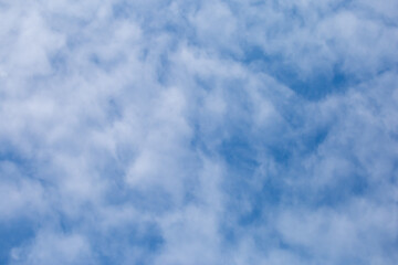 Soft white clouds texture on beautiful afternoon sky background. Image for background design The clear sky makes you feel fresh and clear.