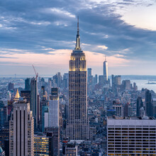 Manhattan Skyline With Empire State Building At Dusk, New York City, USA