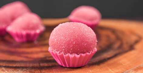 Strawberry brigadeiro. Traditional Brazilian sweet called Bicho de Pé. brigadeiro (brigadier) made out of strawberries