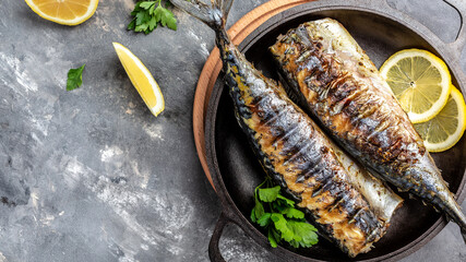 Wall Mural - Oktoberfest menu. Grilled mackerel fish with lemon herbs and spices, Long banner format, top view