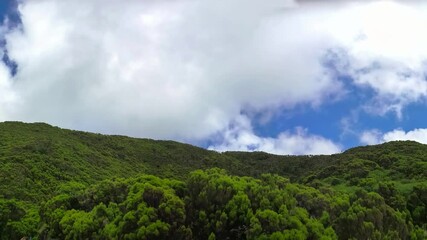 Wall Mural - Beautiful panorama on a green mountain with cloudy sky