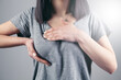 © Artvibe - girl presses her hands on her chest chest pain