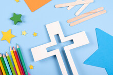  Vacation Bible School Craft Supply With Wooden Cross. Christian Concept. 
Copy Space Text. Selective Focus.