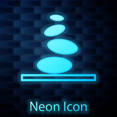 Wall Mural - Glowing neon Stack hot stones icon isolated on brick wall background. Spa salon accessory. Vector