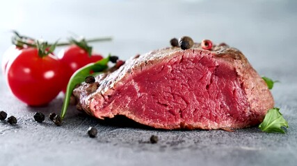 Wall Mural - grilled beef fillet with falling peppers