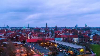 Wall Mural - Hanover, Germany. Aerial view of Hanover, Germany skyline during the cloudy sunrise. Time-lapse of historical landmarks in the city, zoom in