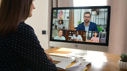 Diverse multiracial people involved video meeting, video conference. Woman using computer app for video connection for many colleagues together on the distance, screen with a lot of employees profiles