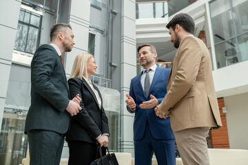 Poster - Lawyers discussing new case in lobby