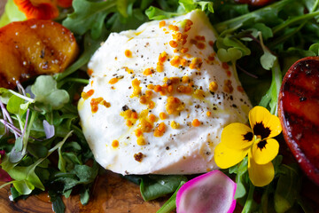 Wall Mural - fresh colorful healthy salad served on a wooden board