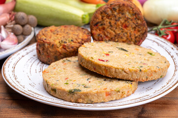 Round vegetarian patties or burgers made from grains, vegetables and legumes