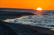 Zachód słońca nad morzem bałtyckim w Trzęsaczu, Polska, Trzesacz