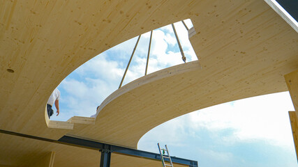 CLOSE UP: Contemporary CLT house is being assembled on a sunny spring day.