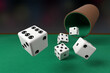 Close-up of dice rolling on a green cloth. 3d illustration.