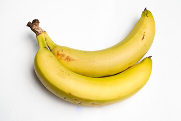 Two bananas are displayed on a white background.