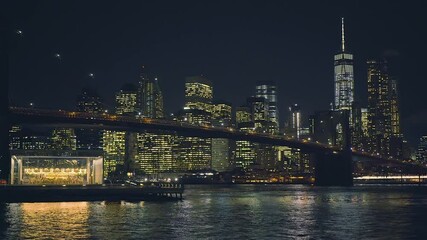 Fototapete - Brooklyn bridge and Manhattan at night, New York City.