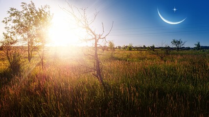 Wall Mural - ramadan background . crescent moon with beautiful sunset background