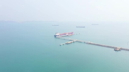 Wall Mural - Aerial view oil tanker of business logistic sea going ship, Crude oil tanker lpg ngv at industrial estate Thailand, Group Oil tanker ship to Port of Singapore - import export . 4K