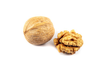 Delicious whole and broken walnuts isolated on white background. Whole and cracked walnut.