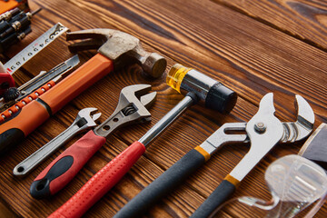 Wall Mural - Different workshop instrument, wooden background