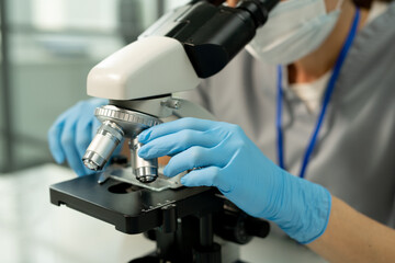Poster - Adjusting microscope slide in laboratory