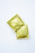Top view of the raw green ravioli pasta on the white surface