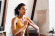 © InsideCreativeHouse - Beautiful african-american young woman doing fitness in sporty clothes indoors. Healthy fit young woman in activewear sitting on mat in living-room and doing sit-ups
