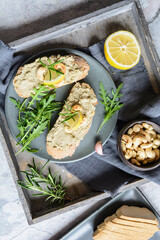Wall Mural - Green lentil spread with smoked tofu and roasted cashew nuts