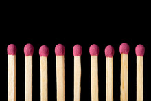Row Of Pink Matches On A Black Background, Close Up. Nice Looking Safety Matches, Isolated.