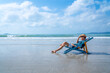 © CandyRetriever  - Asian man resting on beach chair at tropical beach. Happy guy sunbathing or nap on sunbed by the sea in sunny day. Young man relax and enjoy beach outdoor activity lifestyle on summer holiday vacation