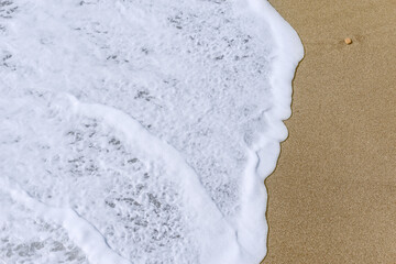  Wave of the sea water at sunny day time.