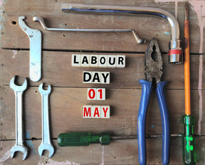 International Labour day Concept on 1st May with blocks with text written on write blocks, copy space Top view.