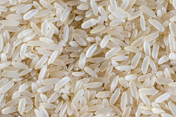 Wall Mural - White rice grains background or texture. Gluten-Free and healthy vegeterian food.