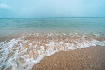 The beach on the island on a rainy day