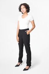 Wall Mural - Woman in black slack pants and white tee full body