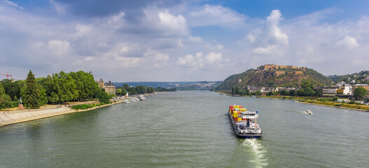 Wall Mural - Panorama of a cargo ship on the river Rhine near Koblenz, Germany