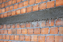 A Thick Mortar Layer Joins The Red Brick Wall, While We Lay The Brick, There Must Be A Period Of The Joint To Increase The Strength Of The Brick Wall.
