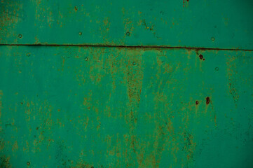  background metal surface with green paint and rust