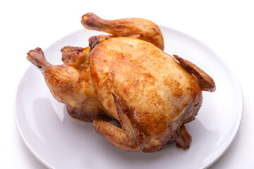 Wall Mural - Baked chicken on a white plate. Isolate