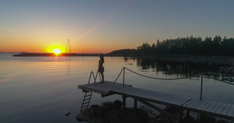 Sticker - Woman standing on a wharf 01