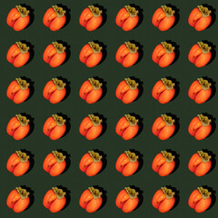 Wall Mural - Seamless rhythmic pattern made of one ugly orange persimmon on dark green background with hard shadows.